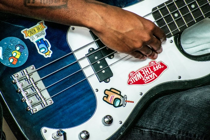 a person holding a guitar